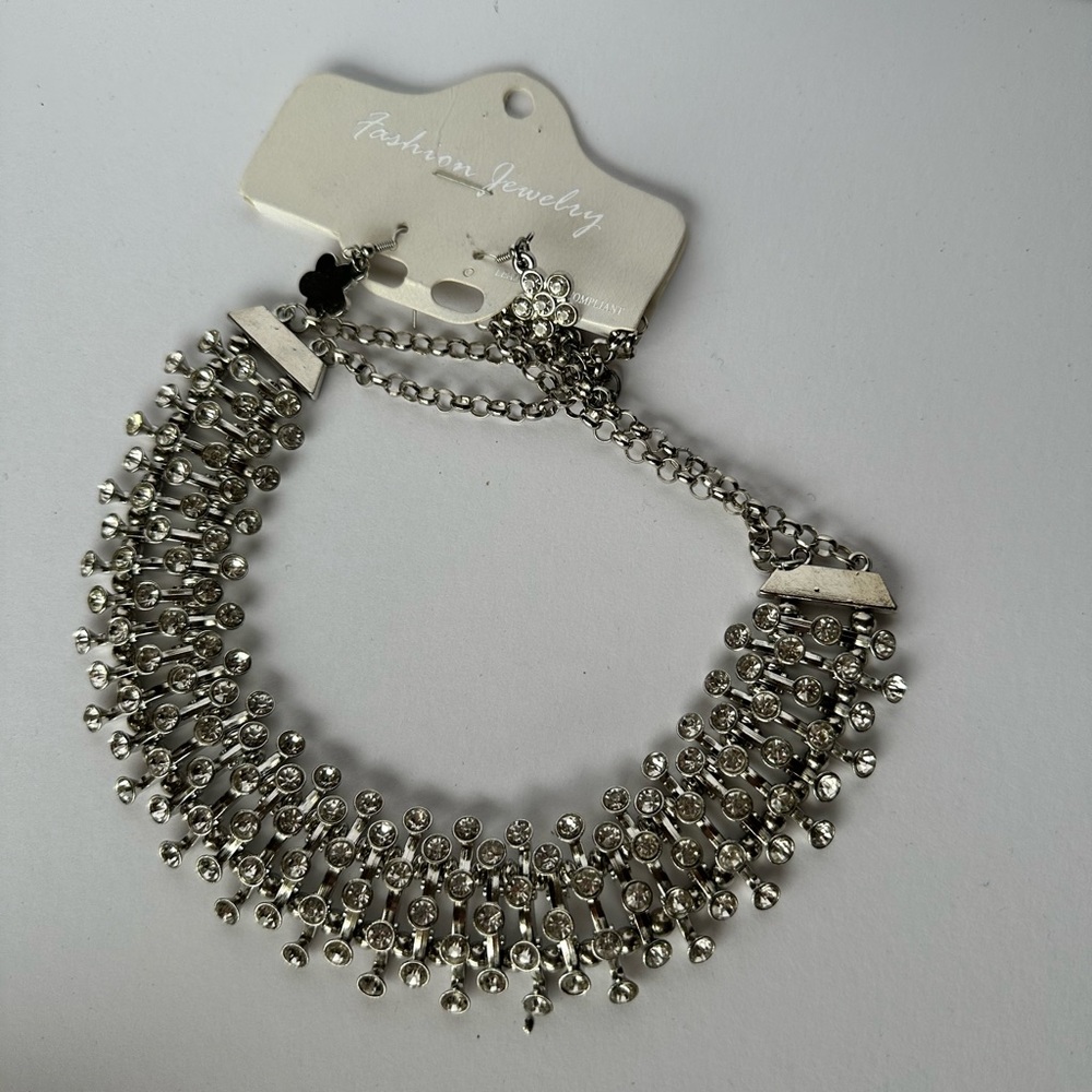 Fashion jewelry set. Earrings and necklace